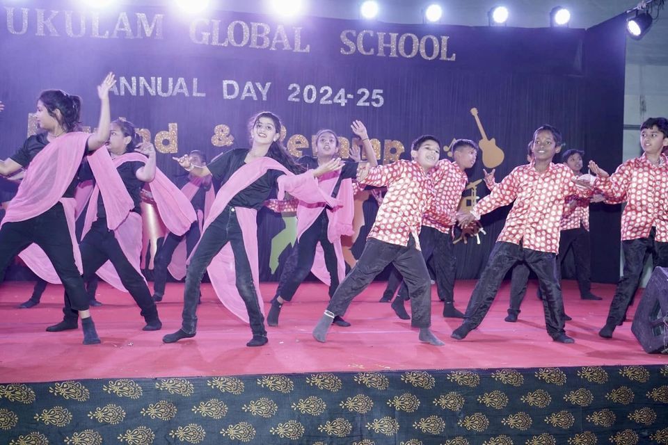 Students dancing on stage at Annual Day