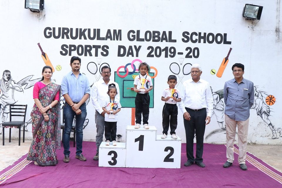Trust members and guests with the podium winners at Sports Day 2019-20