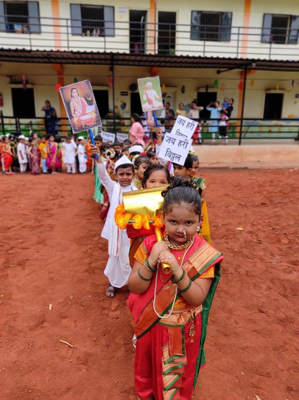 A young Rani Laxmibai with her placard
