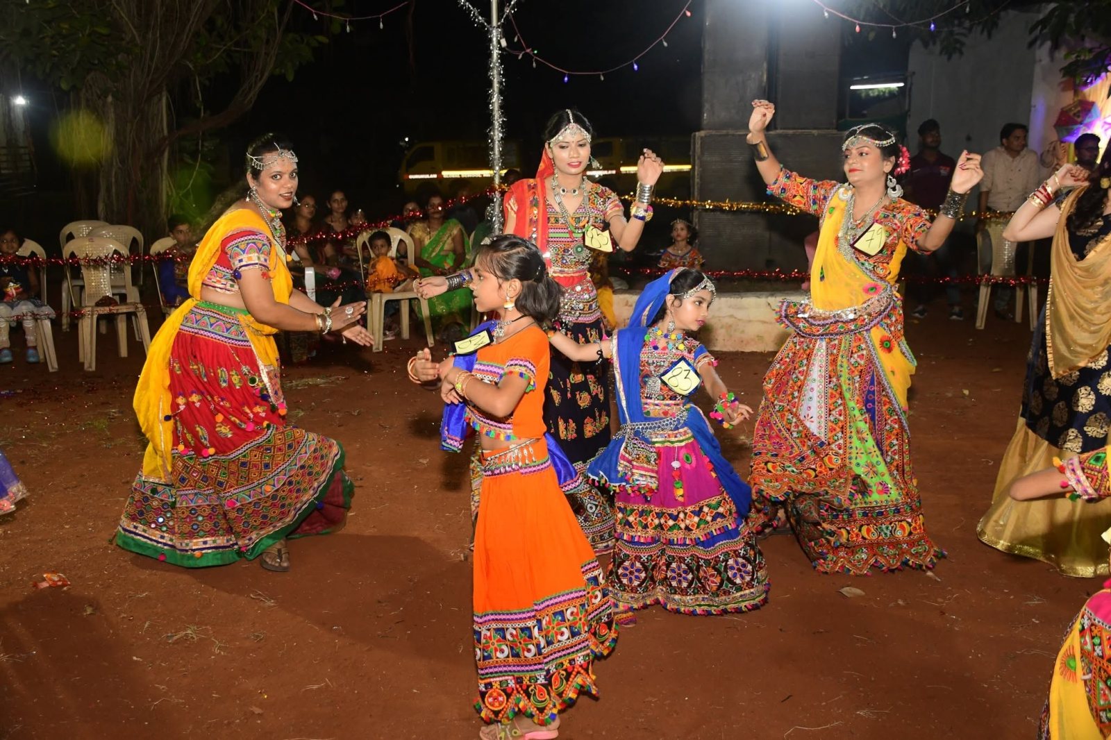 Children in chaniya choli mid-dance