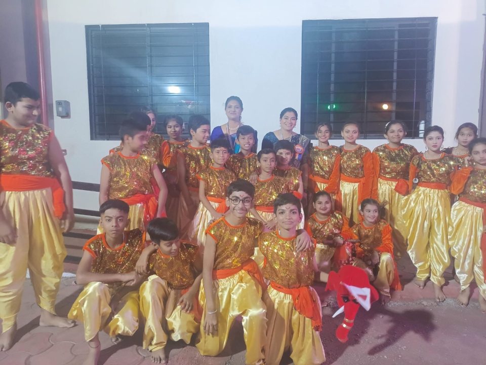 The dance troupe backstage before their act