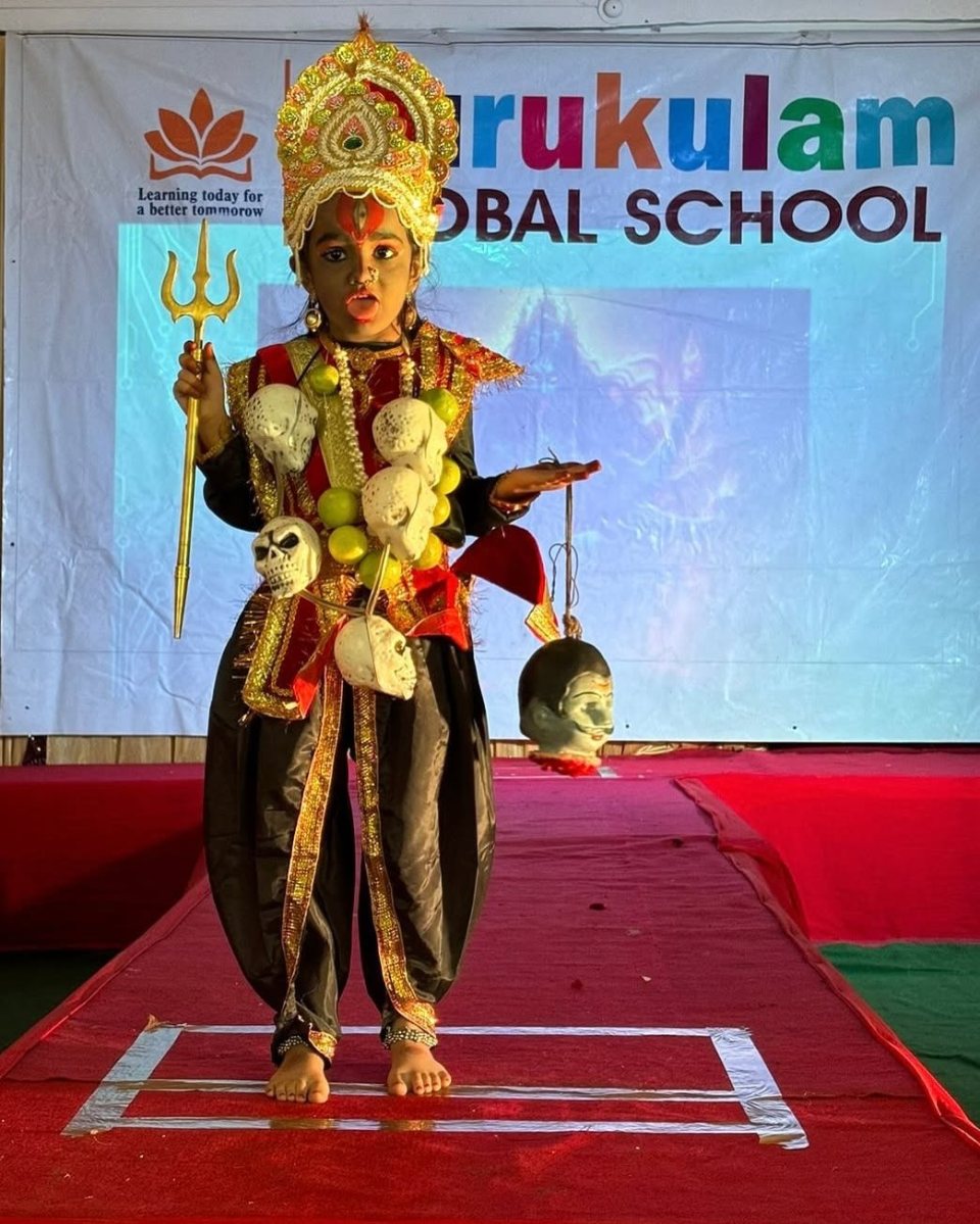 Dressed as a deity for the fancy dress round