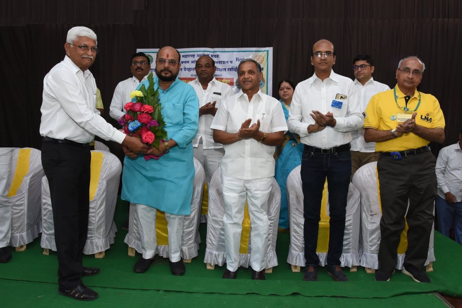 Trust members and Rotary guests on the dais