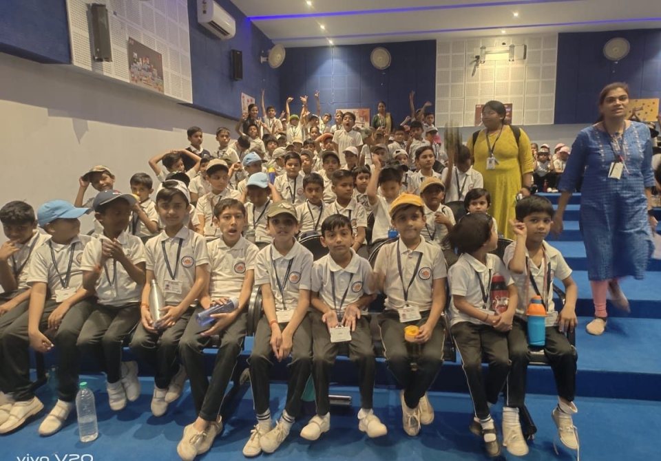 Classes seated in the auditorium