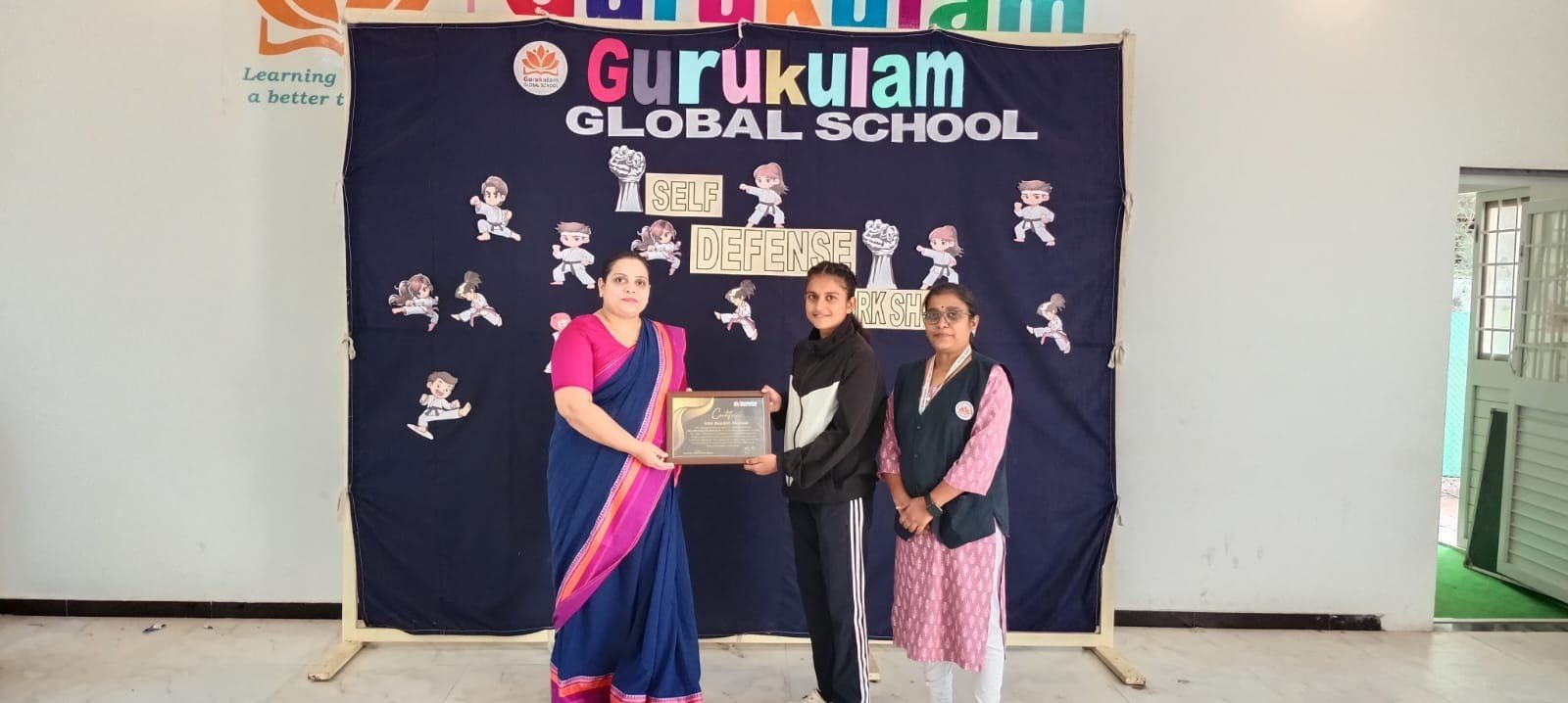 Felicitated in front of the sports board