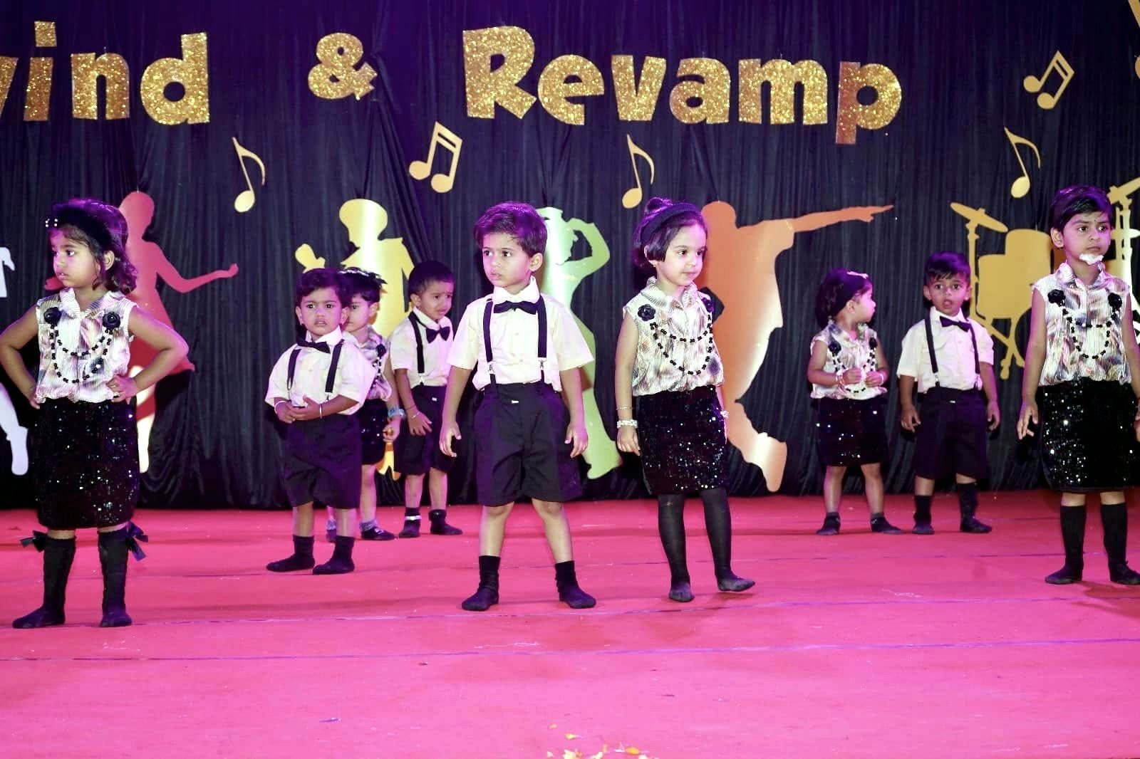 Pre-primary children in bow ties for their act