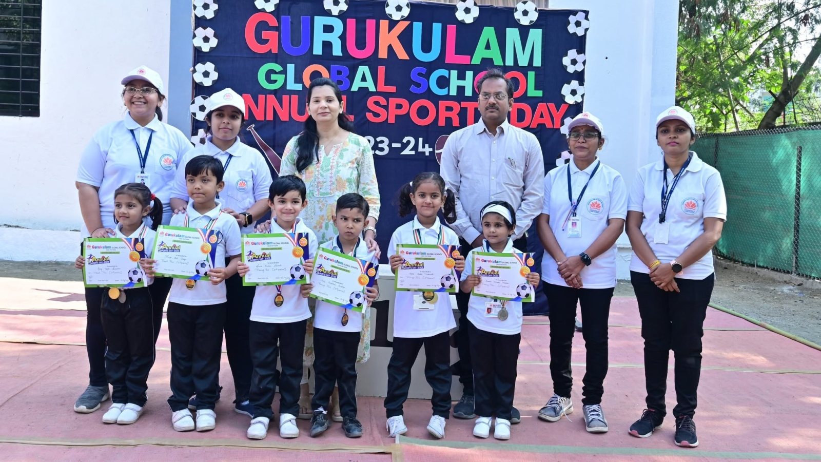 Winners with their certificates and the guests