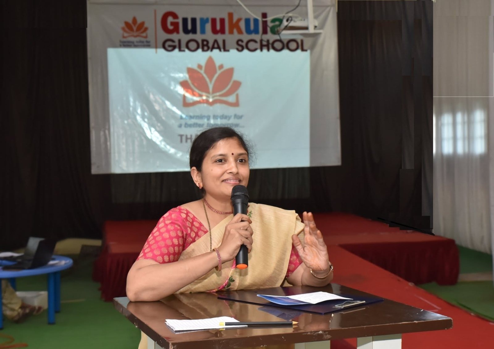 A guest speaker addresses the parents