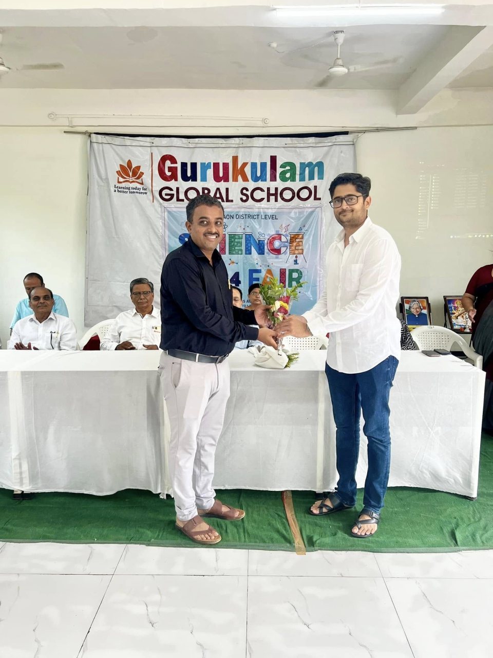 The school felicitates a member of the organising team