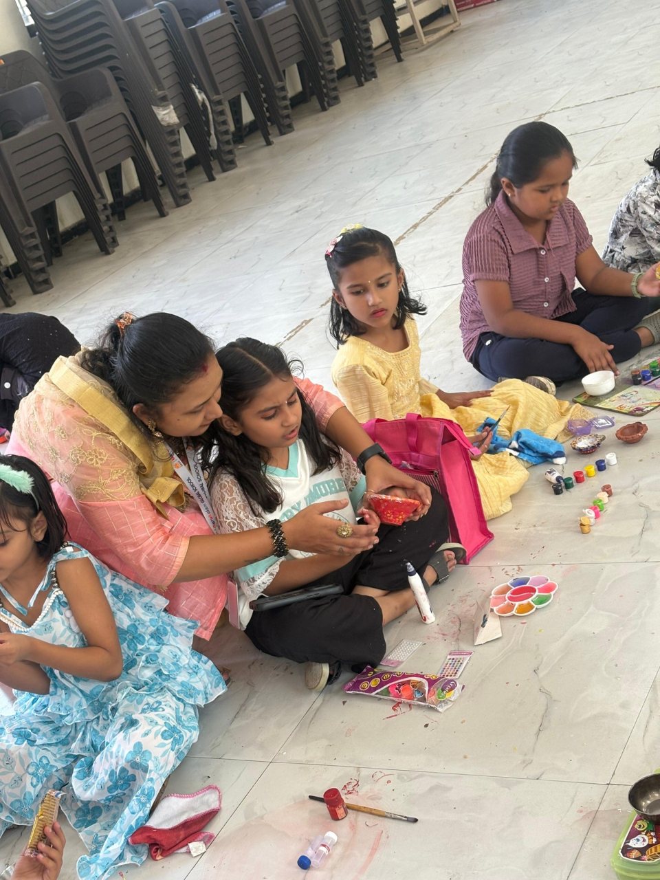 Painting a diya, close up