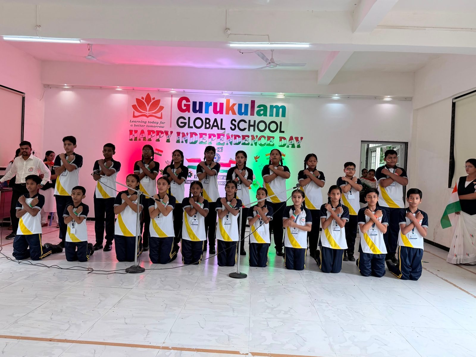 The school choir before the Independence Day banner