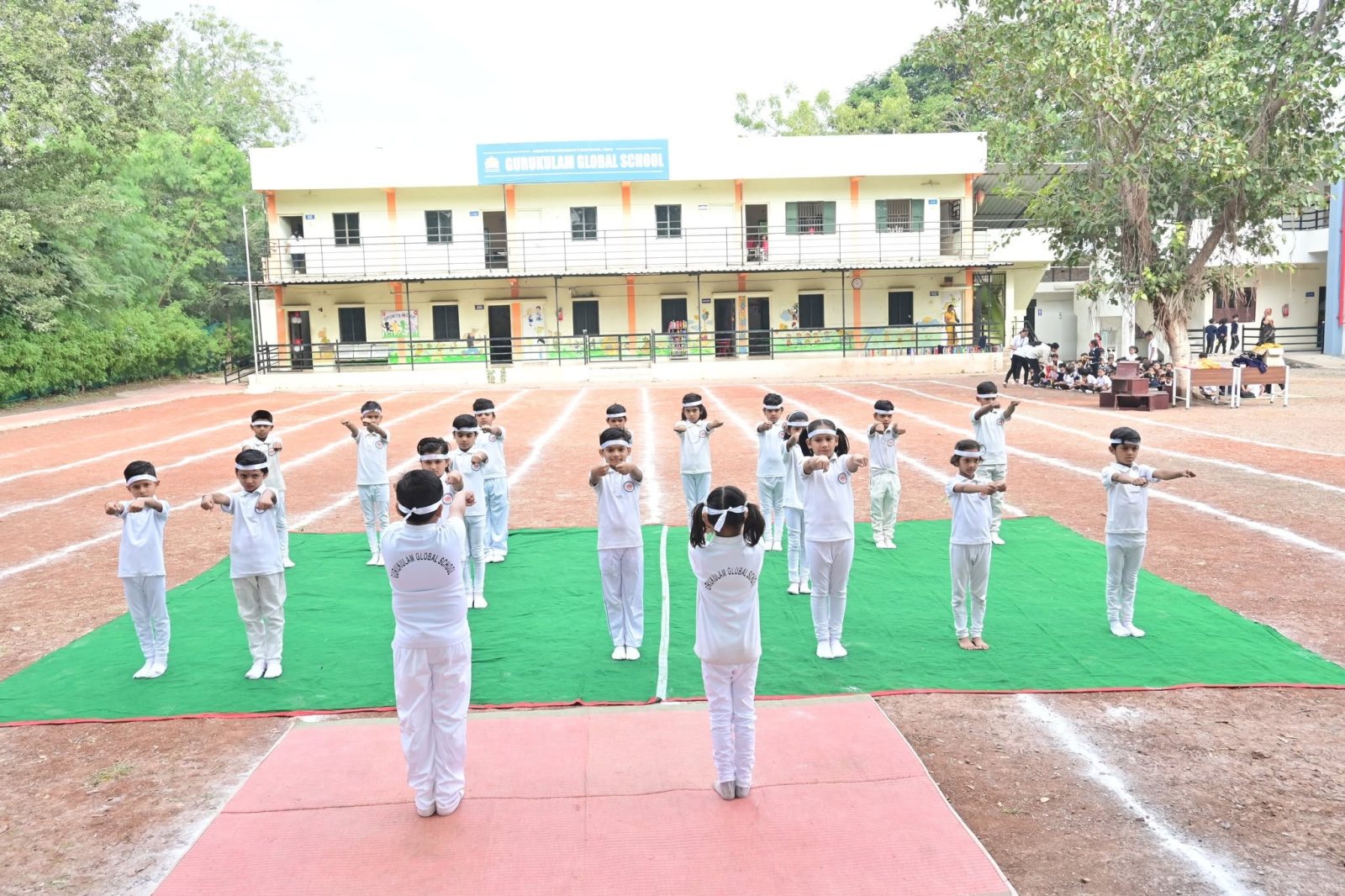 The drill display in front of the school building