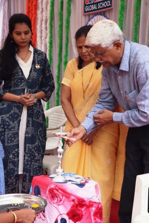 Lighting the lamp at a school programme