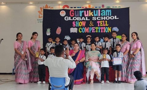 Show and Tell competition winners with their teachers