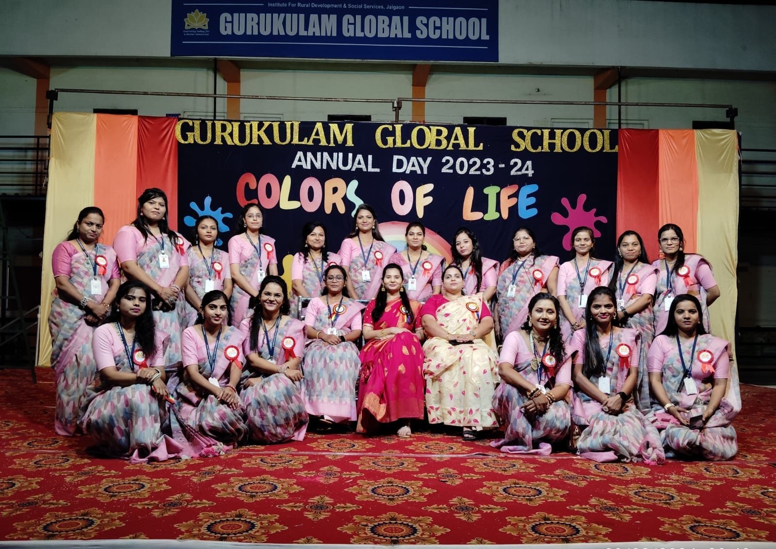 Teaching staff on the Annual Day stage