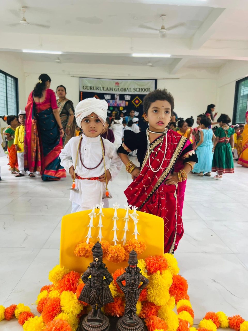 Two children before the Vitthal shrine